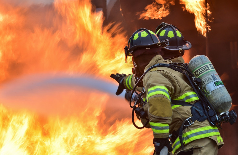 Firefighters battling intense flames